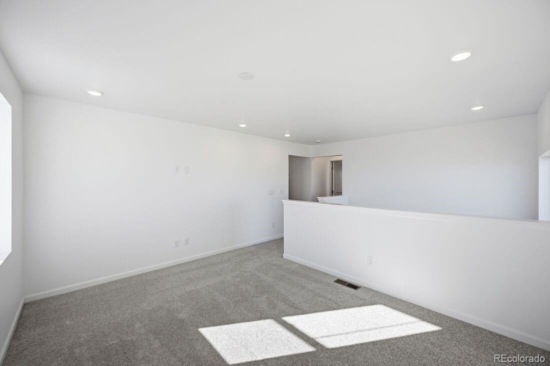 16857 West 92nd Loop Arvada, CO 80007 - Photo 26 of 31 a view of an empty room