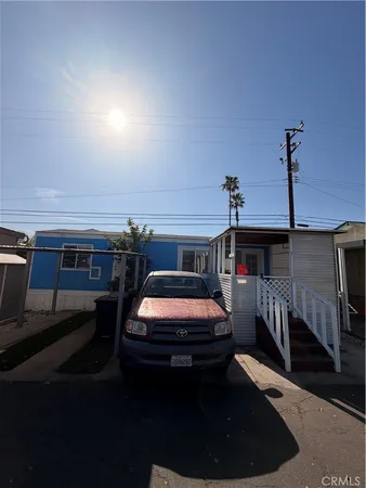 a view of a balcony with chairs
