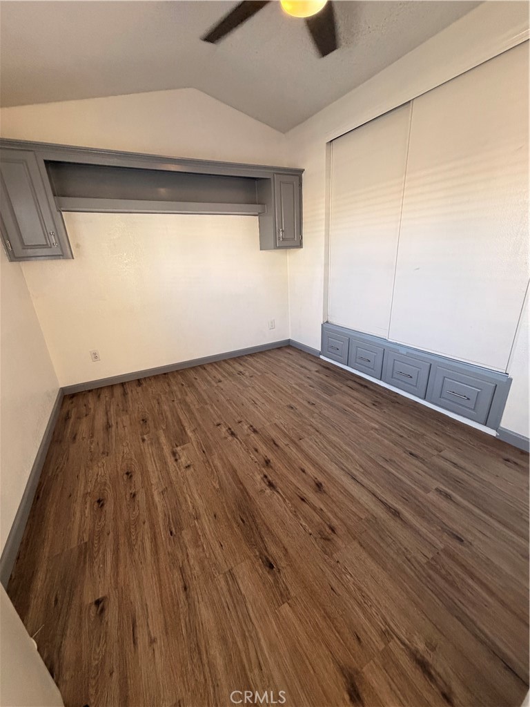 16511 Garfield Avenue, Unit D40 Paramount, CA 90723 - Photo 7 of 18 a view of empty room with wooden floor