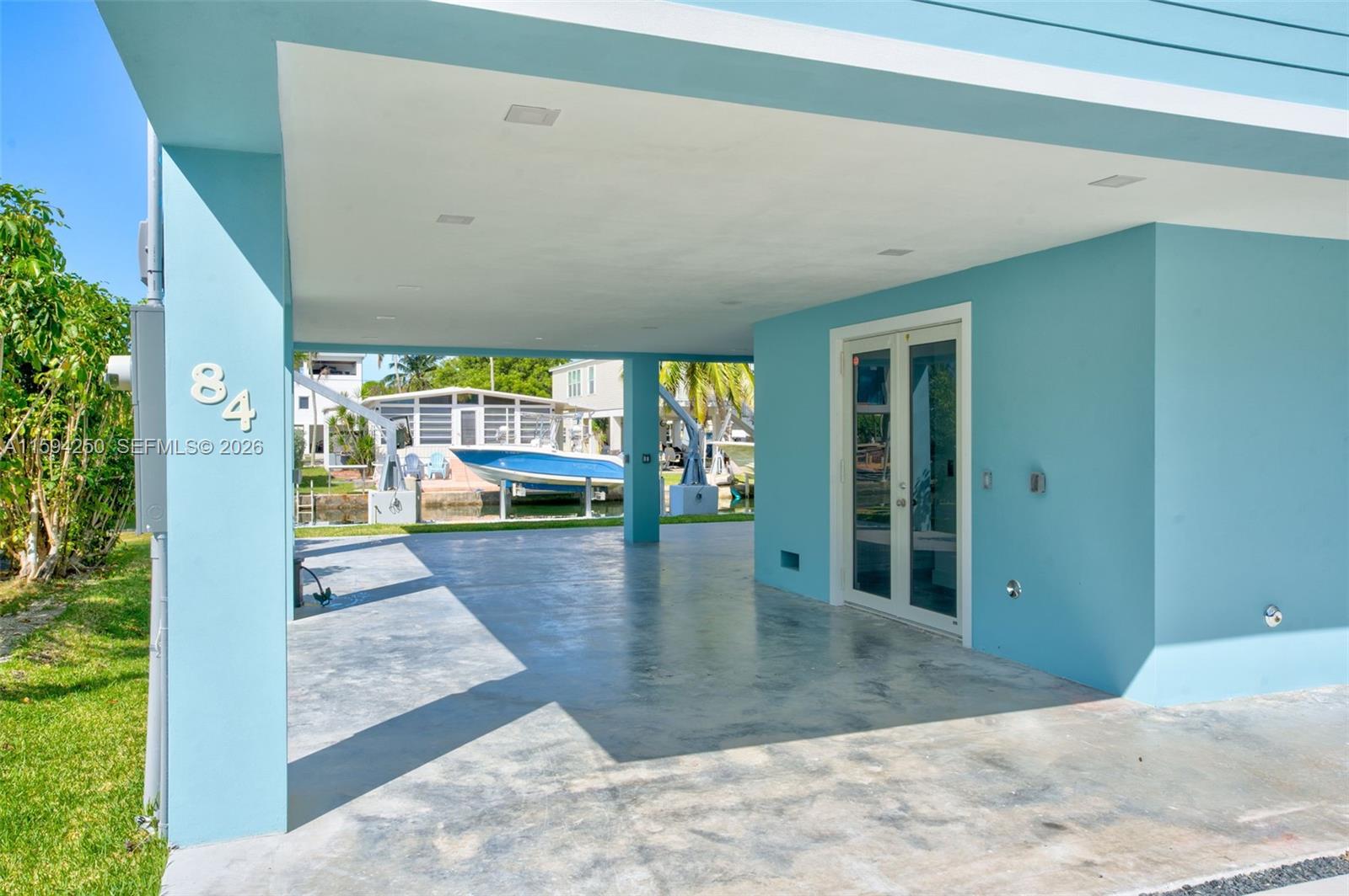 84 Coral Way Key Largo, FL 33037 - Photo 4 of 55 Carport and Entry.