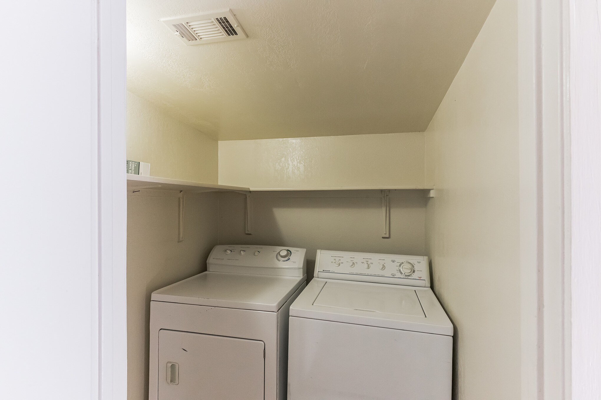 501 East 4th Street Georgetown, TX 78626 - Photo 22 of 25 Laundry area featuring separate washer and dryer