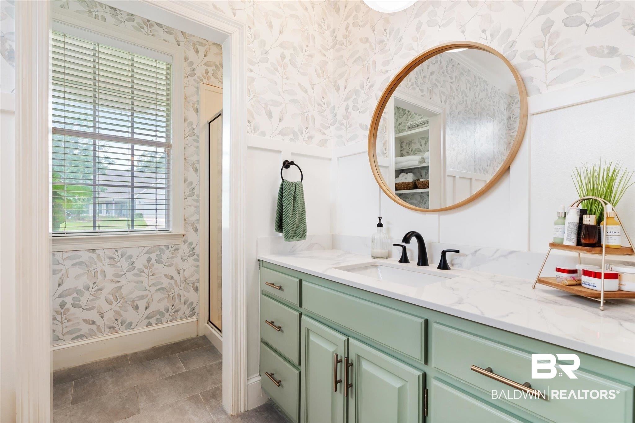 30648 Pine Court Daphne, AL 36527 - Photo 14 of 30 Bathroom featuring a shower with shower door, vanity, and tile patterned flooring