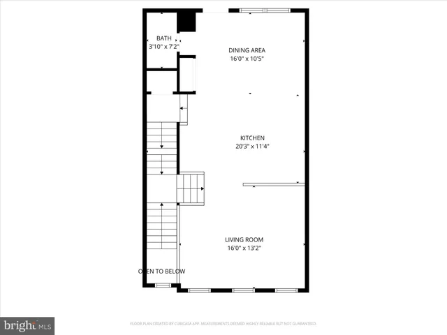 a picture of a bench in front of a wall