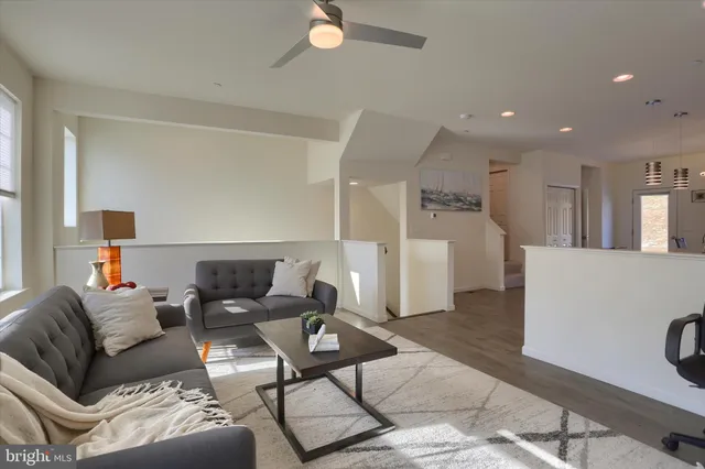 a living room with furniture and a couch