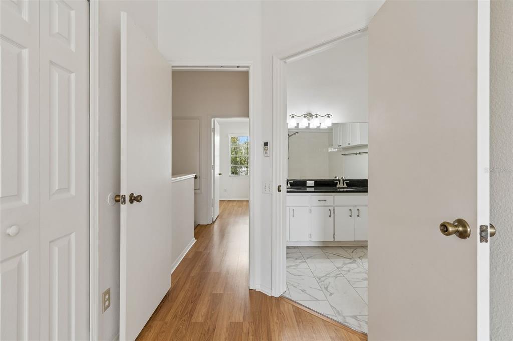 382 Countryside Key Boulevard Oldsmar, FL 34677 - Photo 39 of 58 a bathroom with a sink and a mirror