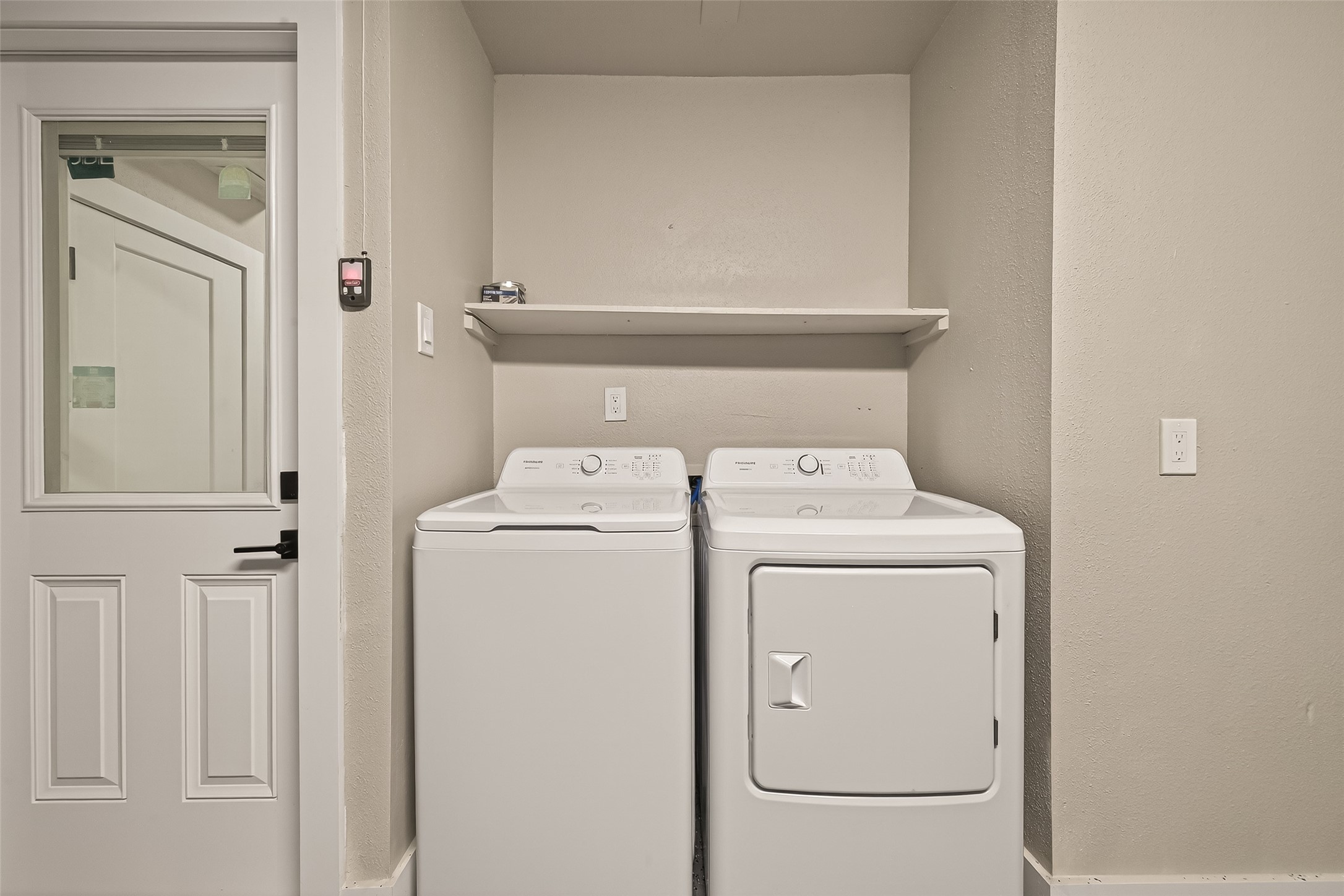 6750 Sands Point Drive Houston, TX 77074 - Photo 33 of 39 Utility room is in the garage and washer and dryer are included!