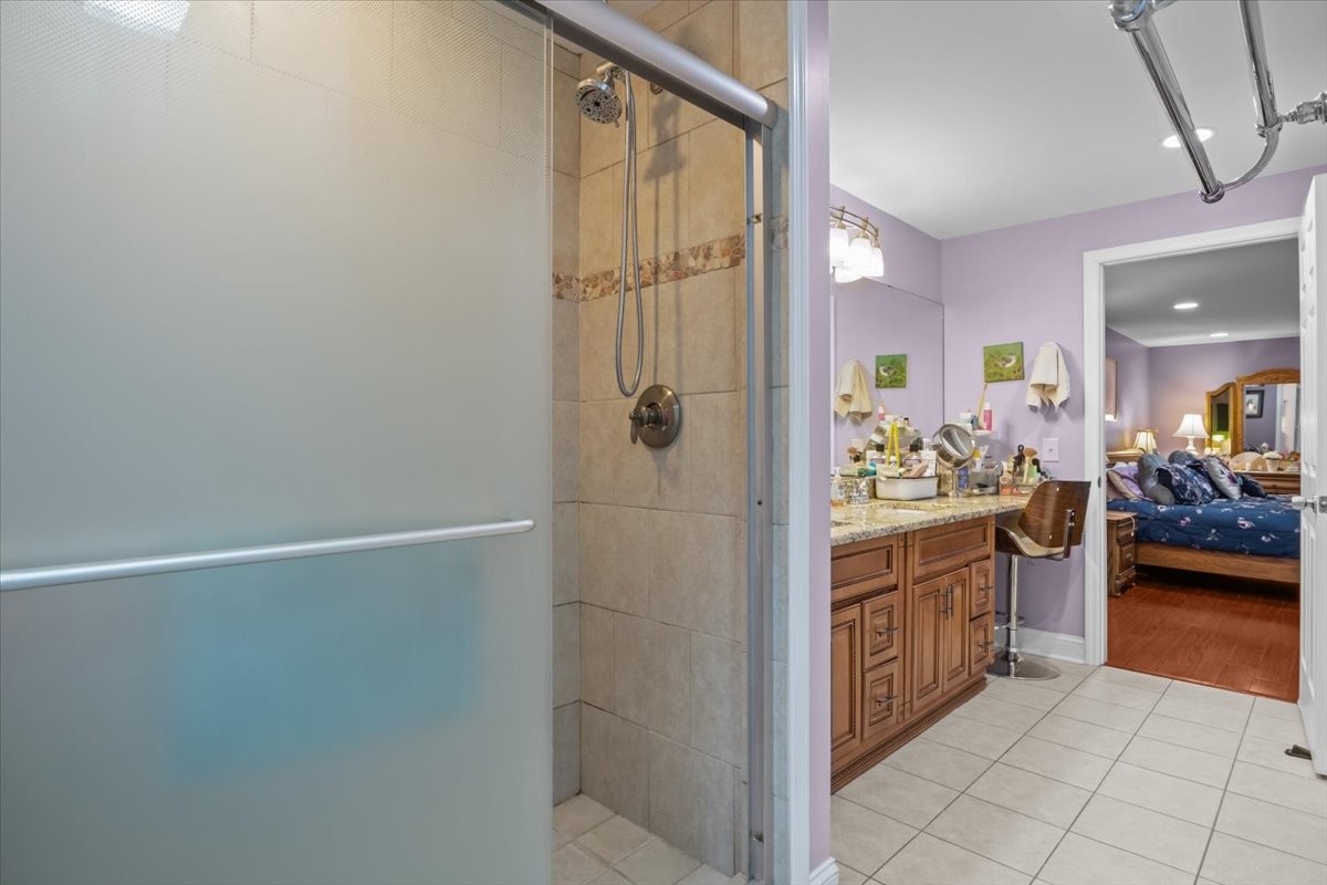307 Crestview Drive Dickson, TN 37055 - Photo 21 of 61 a en suite bathroom with a granite countertop sink and a mirror