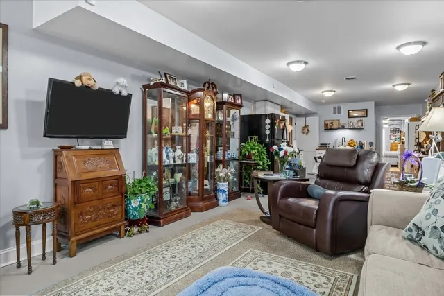 a kitchen with stainless steel appliances granite countertop a stove and a refrigerator