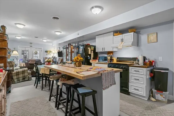 a view of a workspace with furniture