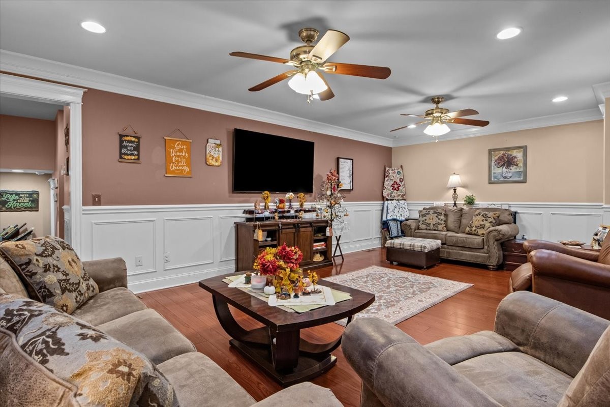 307 Crestview Drive Dickson, TN 37055 - Photo 4 of 61 a living room with furniture kitchen view and a flat screen tv