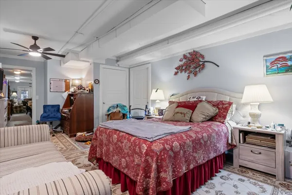 front view of building with potted plants