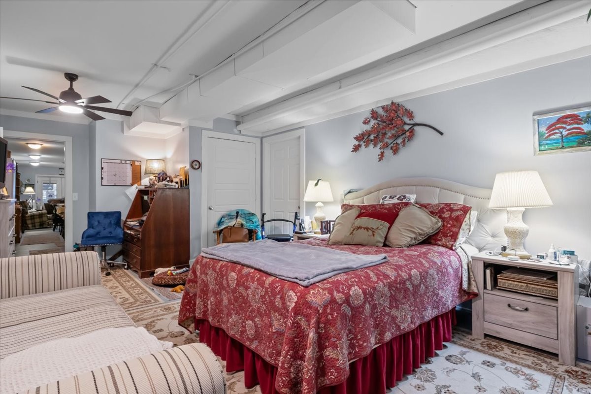 307 Crestview Drive Dickson, TN 37055 - Photo 45 of 61 a bedroom with bed and a chandelier