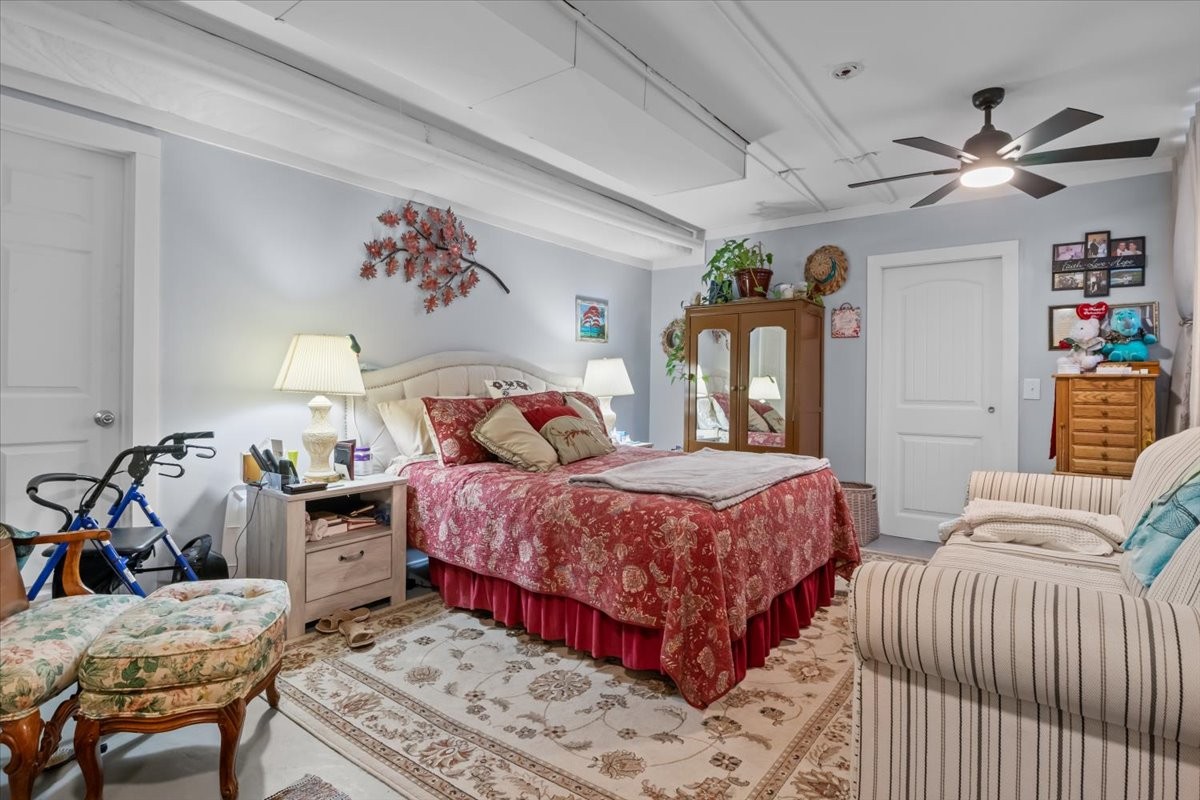 307 Crestview Drive Dickson, TN 37055 - Photo 46 of 61 a bedroom with bed and wooden floor