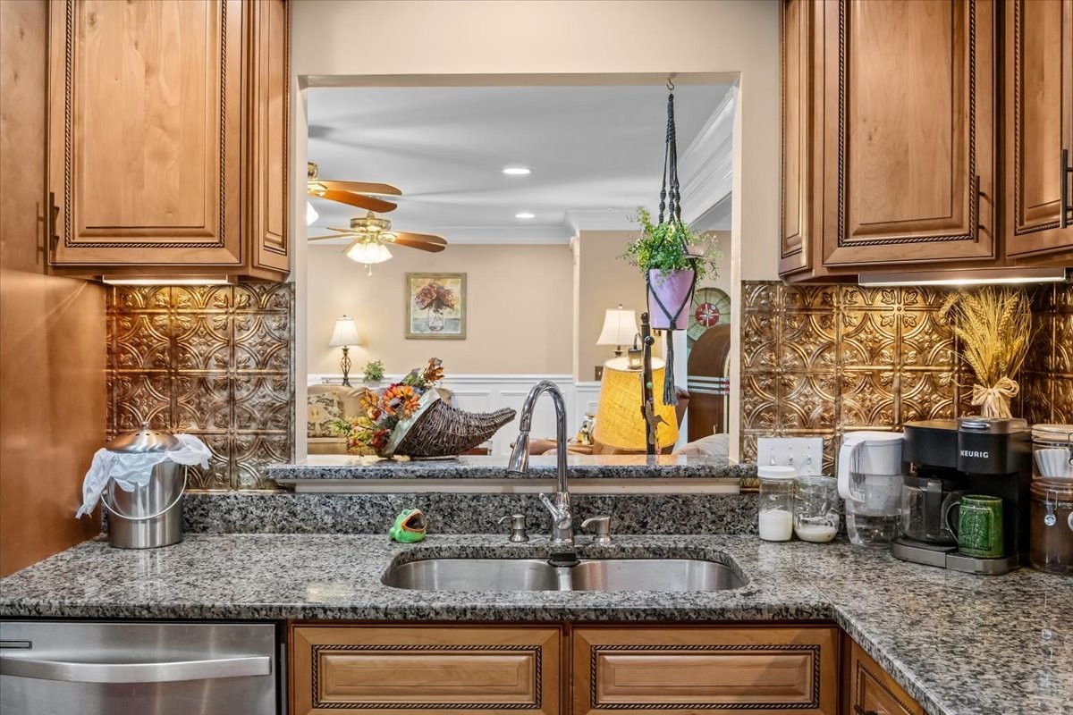 307 Crestview Drive Dickson, TN 37055 - Photo 10 of 61 a kitchen with granite countertop a sink a stove and cabinets