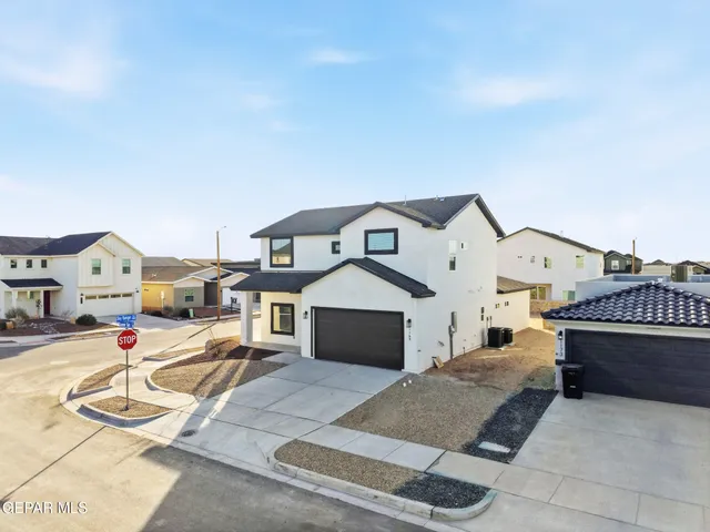 a view of a room with wooden floor and windows