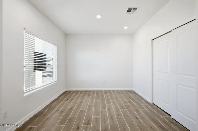 a view of a livingroom with a kitchen