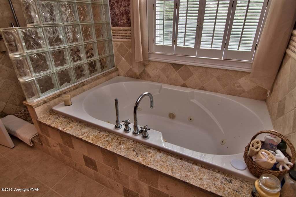4263 High Road Cresco, PA 18326 - Photo 38 of 64 Master Bath Jetted Tub w Granite & Tile