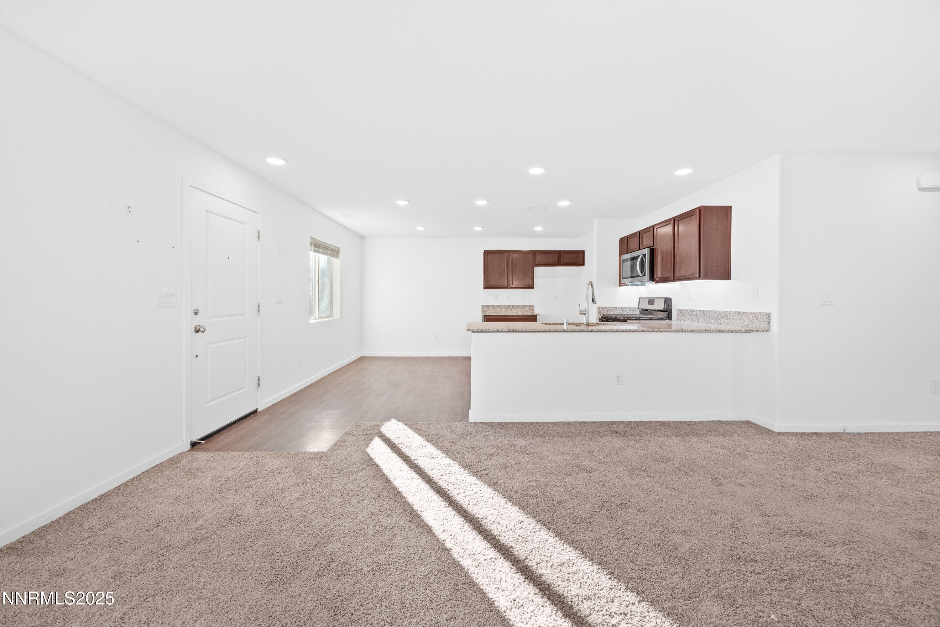 737 Valmy Drive Reno, NV 89506 - Photo 3 of 14 a view of kitchen and kitchen with stainless steel appliances