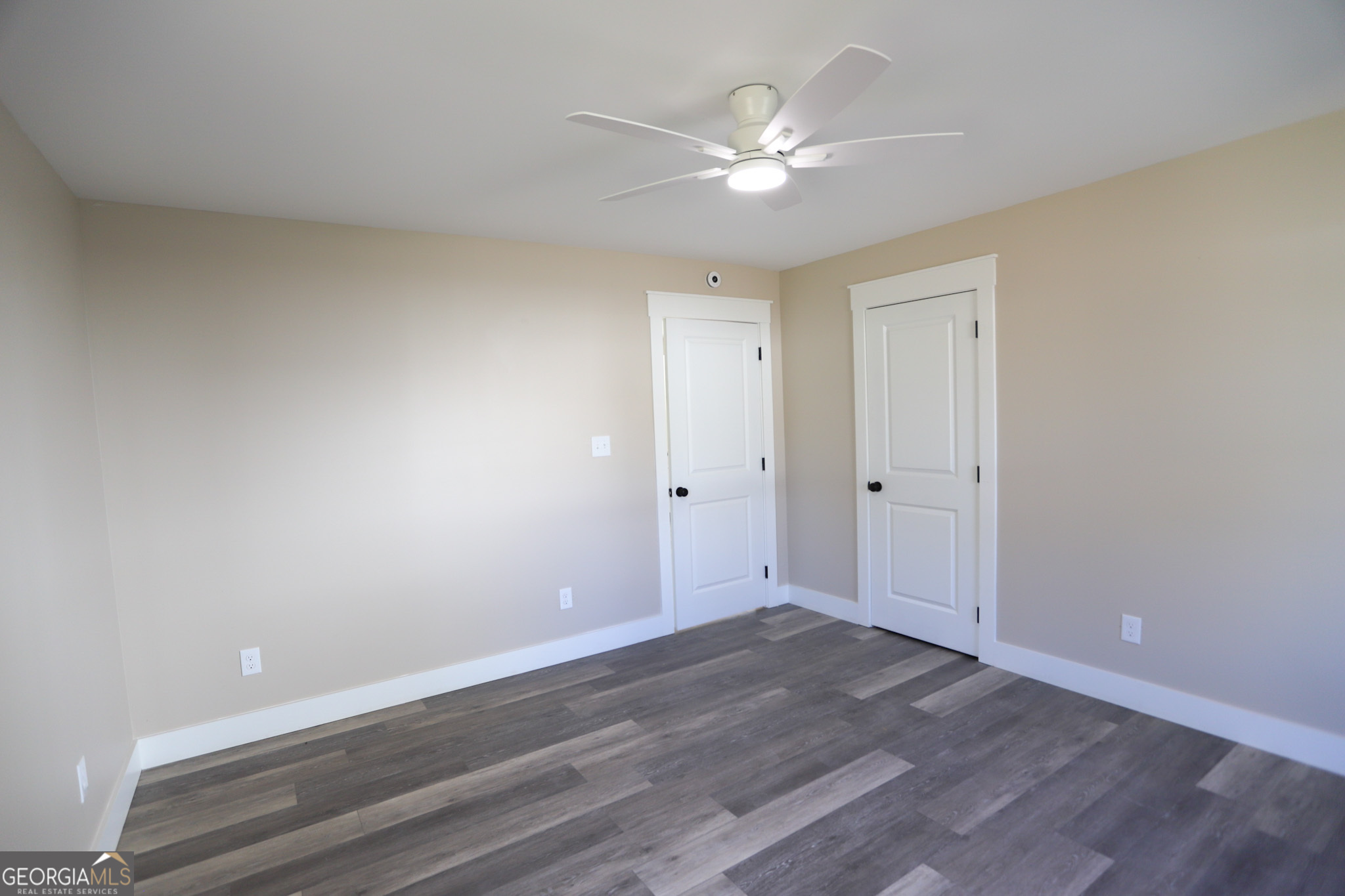 96 Orchard Road Summerville, GA 30747 - Photo 21 of 23 a view of a room with wooden floor and ceiling fan