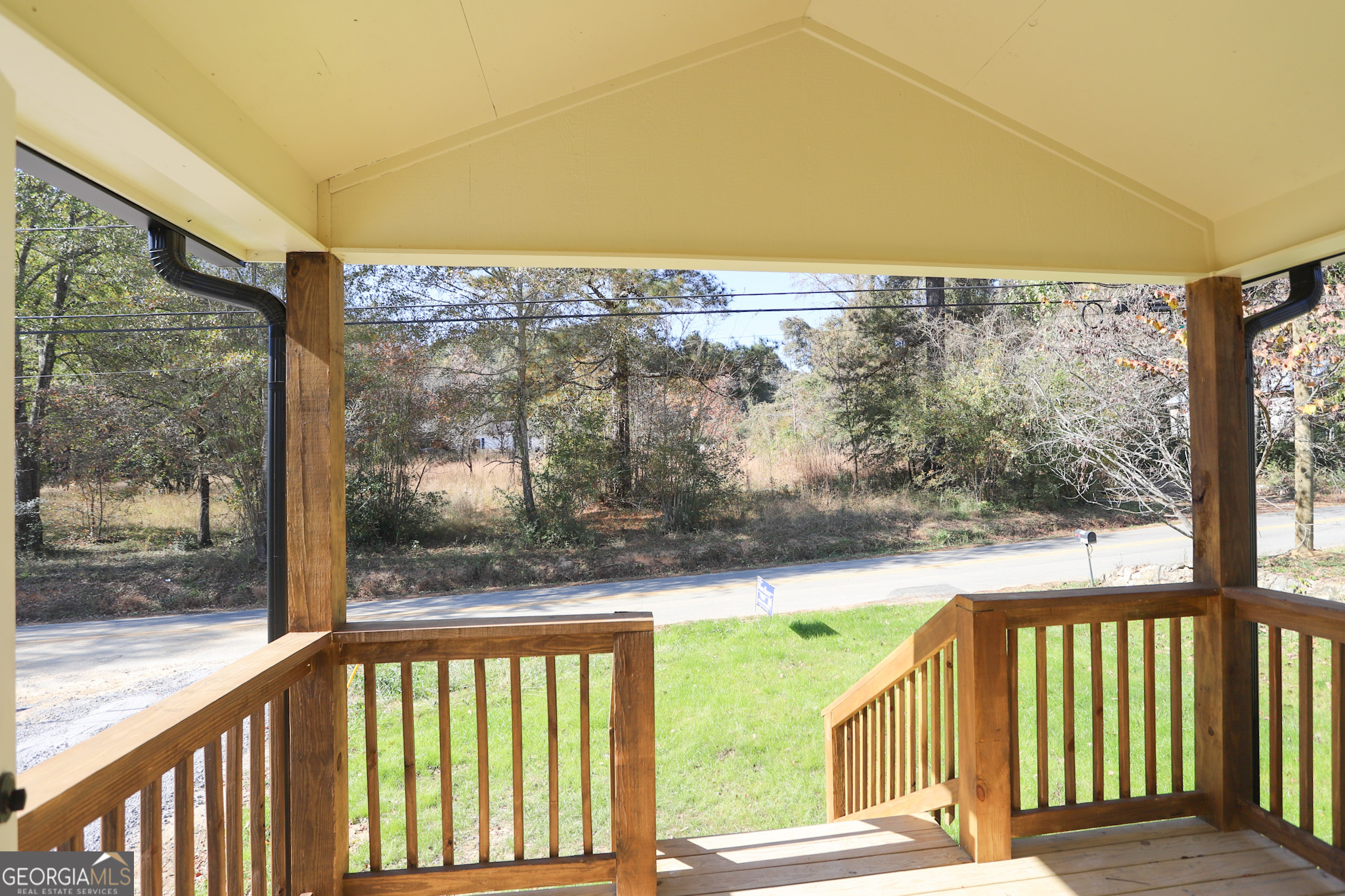 96 Orchard Road Summerville, GA 30747 - Photo 3 of 23 a view of a balcony with furniture