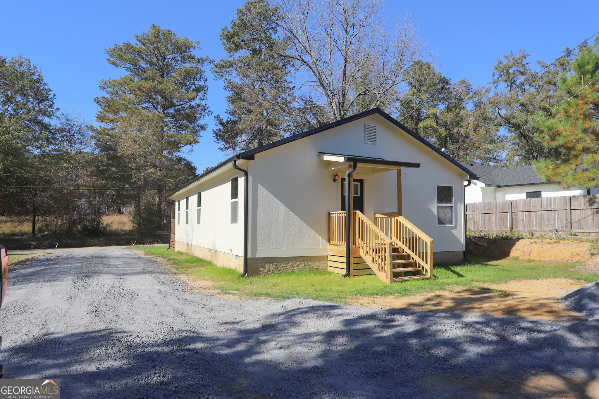 96 Orchard Road Summerville, GA 30747 - Photo 6 of 23 a view of a house with a yard