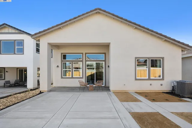 a view of a house with a patio