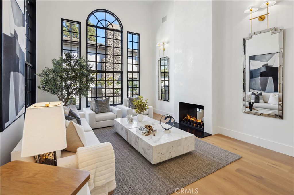 2915 Cliff Drive Newport Beach, CA 92663 - Photo 11 of 69 a living room with furniture and a fireplace
