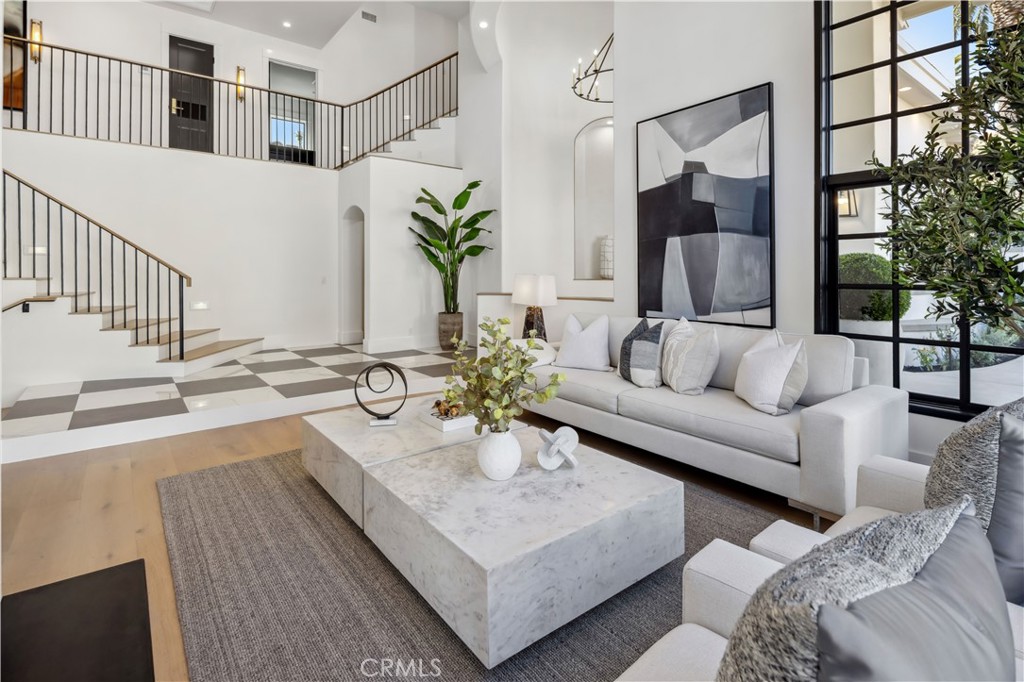 2915 Cliff Drive Newport Beach, CA 92663 - Photo 12 of 69 a living room with furniture and a large window