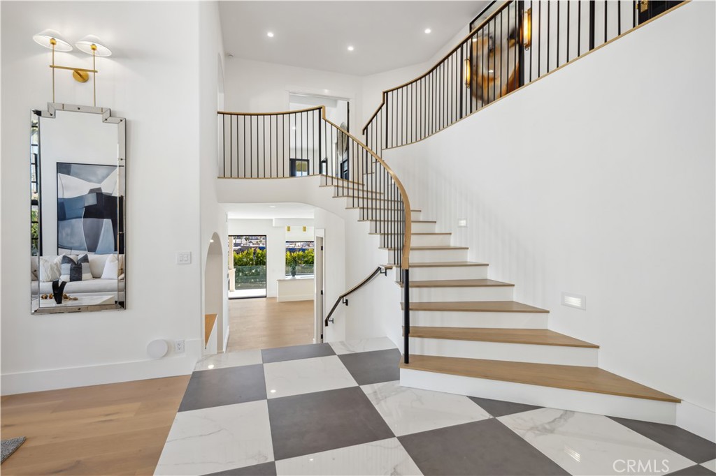 2915 Cliff Drive Newport Beach, CA 92663 - Photo 14 of 69 a view of entryway and hall with wooden floor