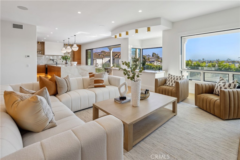 2915 Cliff Drive Newport Beach, CA 92663 - Photo 16 of 69 a living room with furniture and a large window