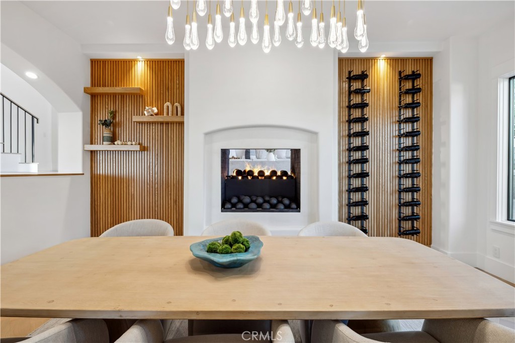 2915 Cliff Drive Newport Beach, CA 92663 - Photo 33 of 69 a view of a dining room with furniture and chandelier