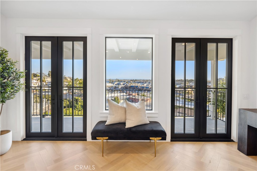 2915 Cliff Drive Newport Beach, CA 92663 - Photo 42 of 69 a living room with furniture and large windows