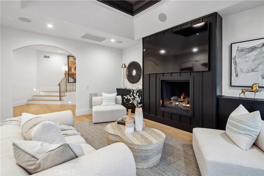 2915 Cliff Drive Newport Beach, CA 92663 - Photo 51 of 69 a living room with furniture and a fireplace