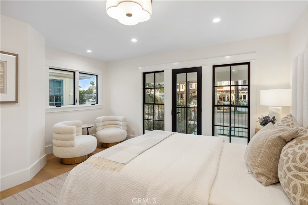 2915 Cliff Drive Newport Beach, CA 92663 - Photo 55 of 69 a bedroom with two beds and a large window