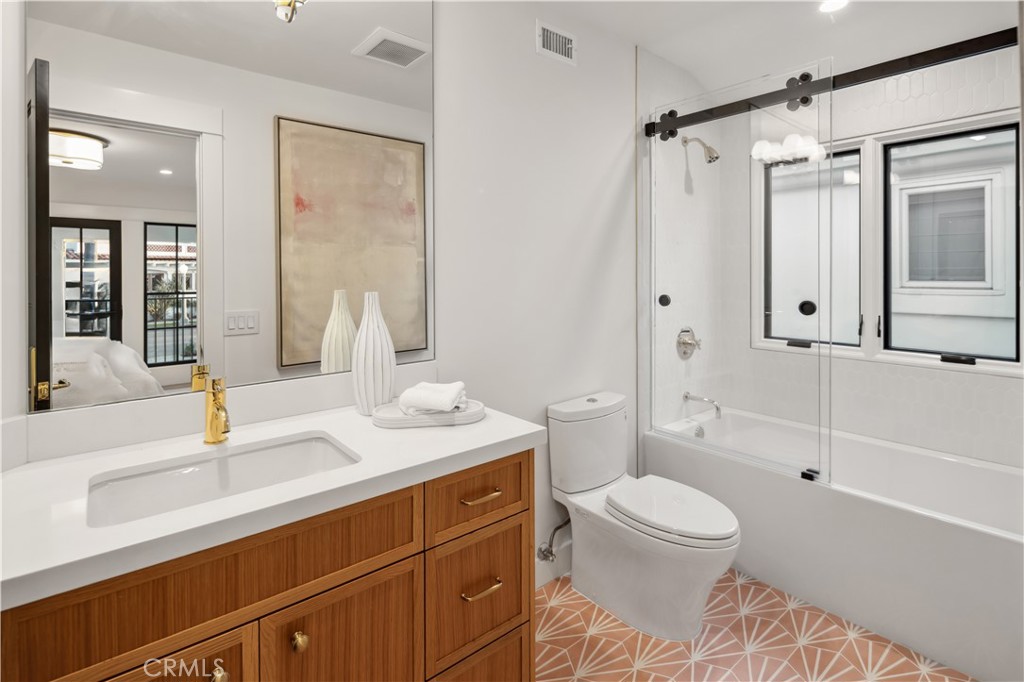 2915 Cliff Drive Newport Beach, CA 92663 - Photo 57 of 69 a bathroom with a sink a toilet and shower