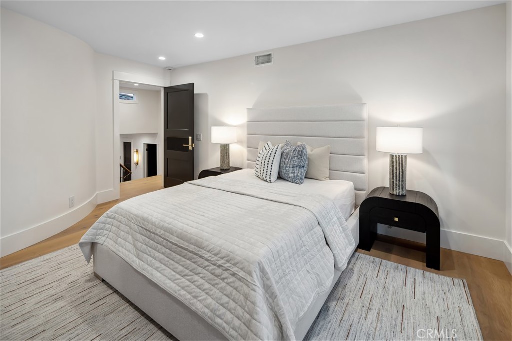 2915 Cliff Drive Newport Beach, CA 92663 - Photo 59 of 69 a bedroom with a bed and a lamp