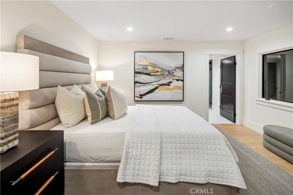 2915 Cliff Drive Newport Beach, CA 92663 - Photo 61 of 69 a bedroom with a bed and painting on the wall
