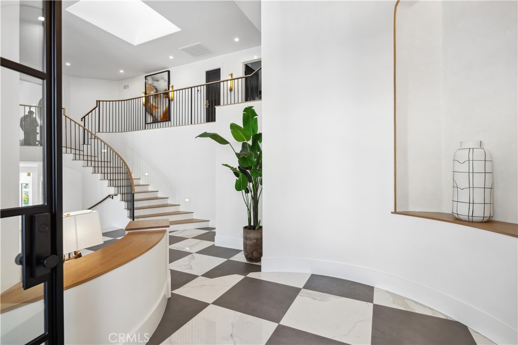 2915 Cliff Drive Newport Beach, CA 92663 - Photo 9 of 69 a view of entryway and hall with wooden floor