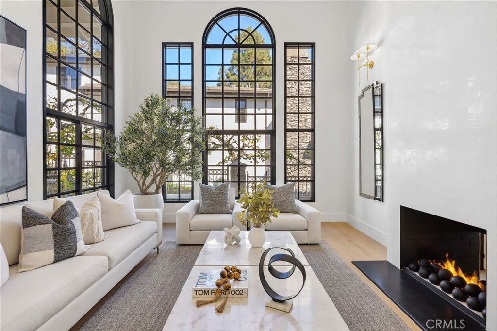 2915 Cliff Drive Newport Beach, CA 92663 - Photo 10 of 69 a living room with furniture a rug and a flat screen tv
