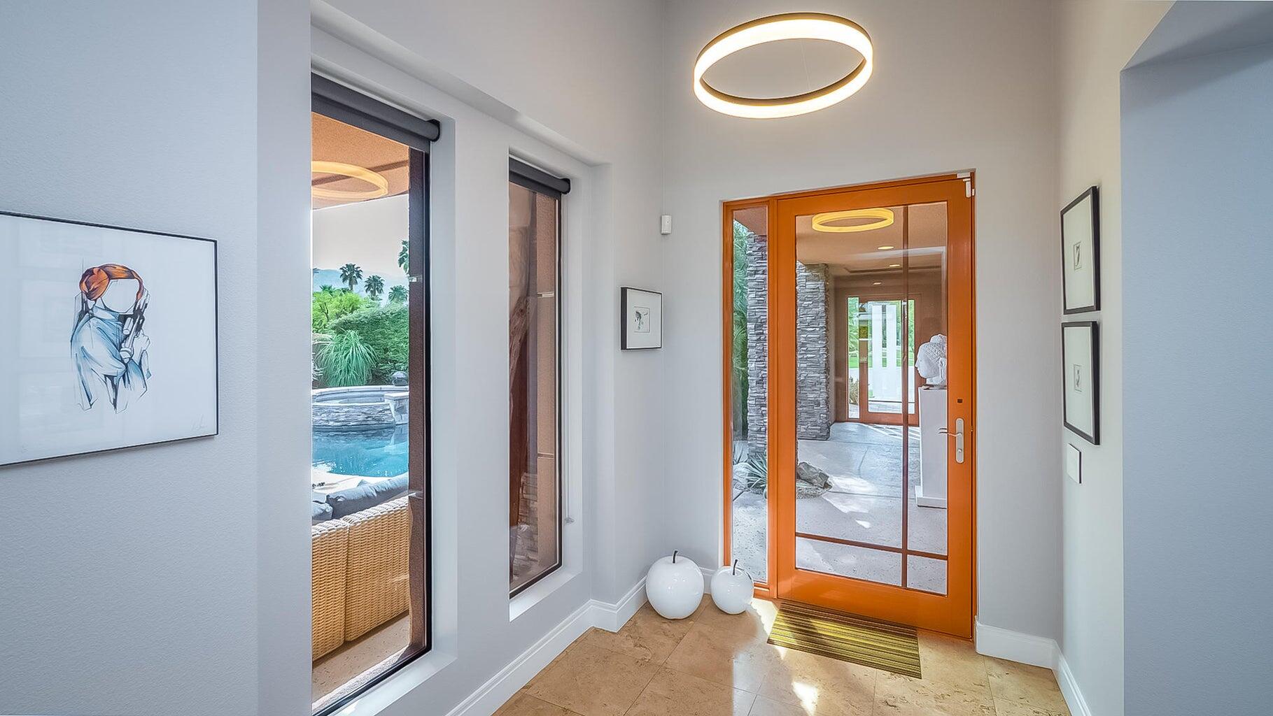 2 Dominion Court Rancho Mirage, CA 92270 - Photo 13 of 40 wooden floor in an empty room and a window