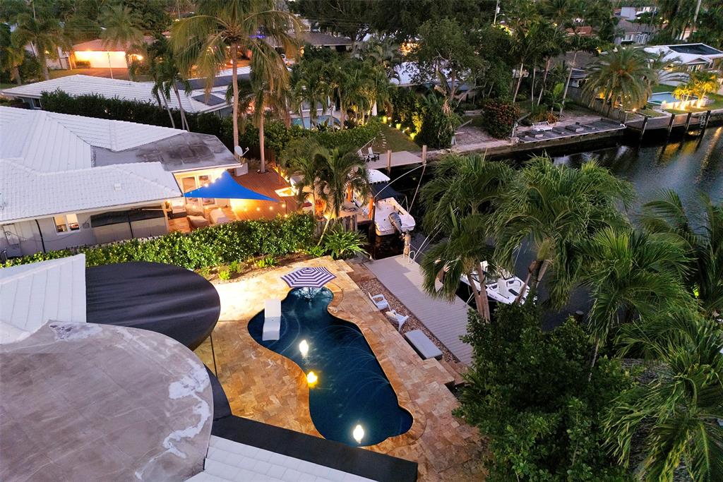 1500 Northeast 24th Street Wilton Manors, FL 33305 - Photo 13 of 88 an aerial view of residential houses with outdoor space