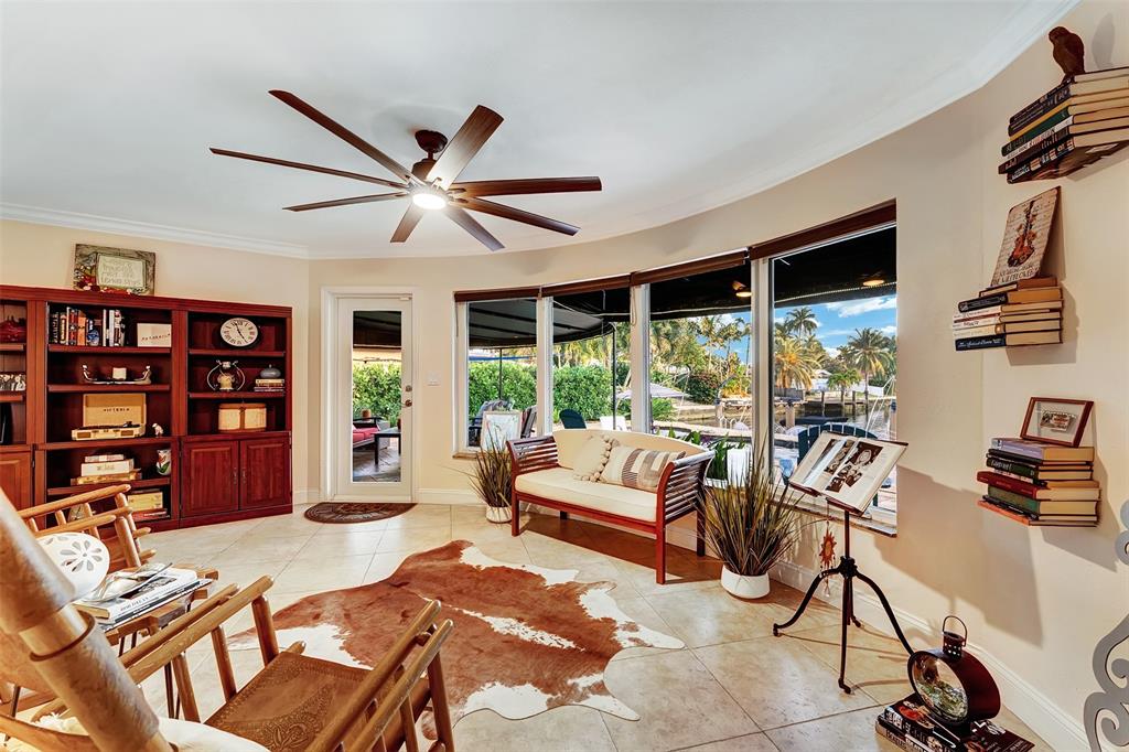 1500 Northeast 24th Street Wilton Manors, FL 33305 - Photo 41 of 88 a living room with furniture and a large window