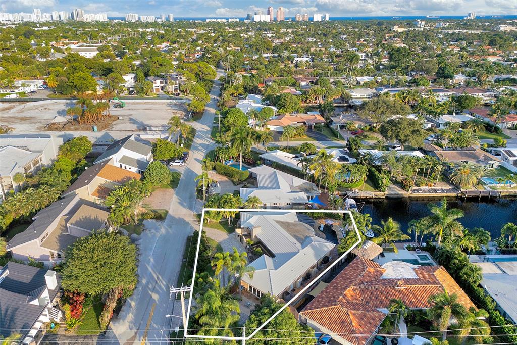 1500 Northeast 24th Street Wilton Manors, FL 33305 - Photo 7 of 88 an aerial view of residential houses with outdoor space