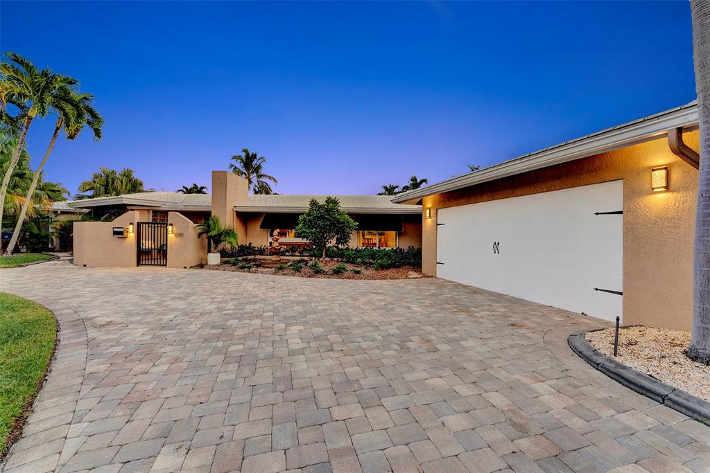 1500 Northeast 24th Street Wilton Manors, FL 33305 - Photo 77 of 88 a view of a house with a patio