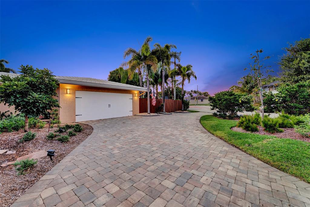 1500 Northeast 24th Street Wilton Manors, FL 33305 - Photo 80 of 88 a view of a house with backyard and trees