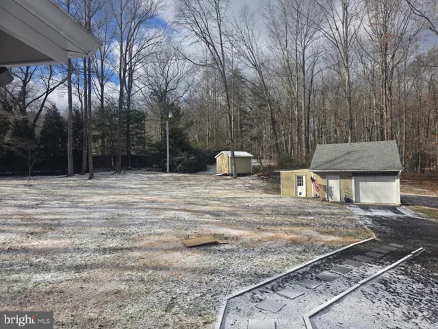 a house view with a outdoor space