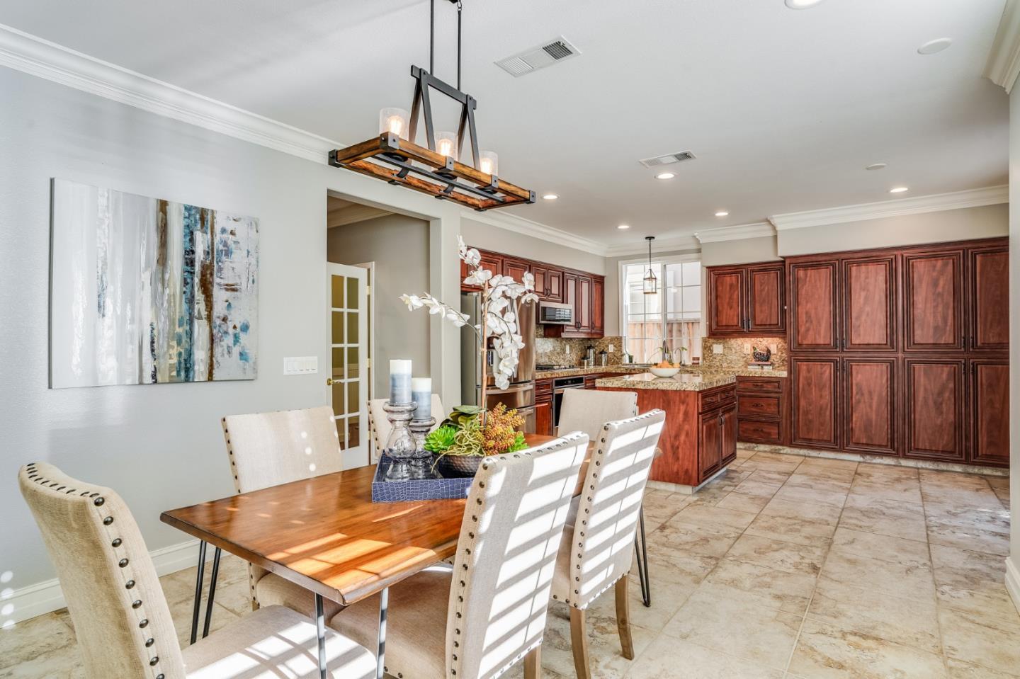 730 St Michael Place Morgan Hill, CA 95037 - Photo 8 of 27 a view of a dining room with furniture