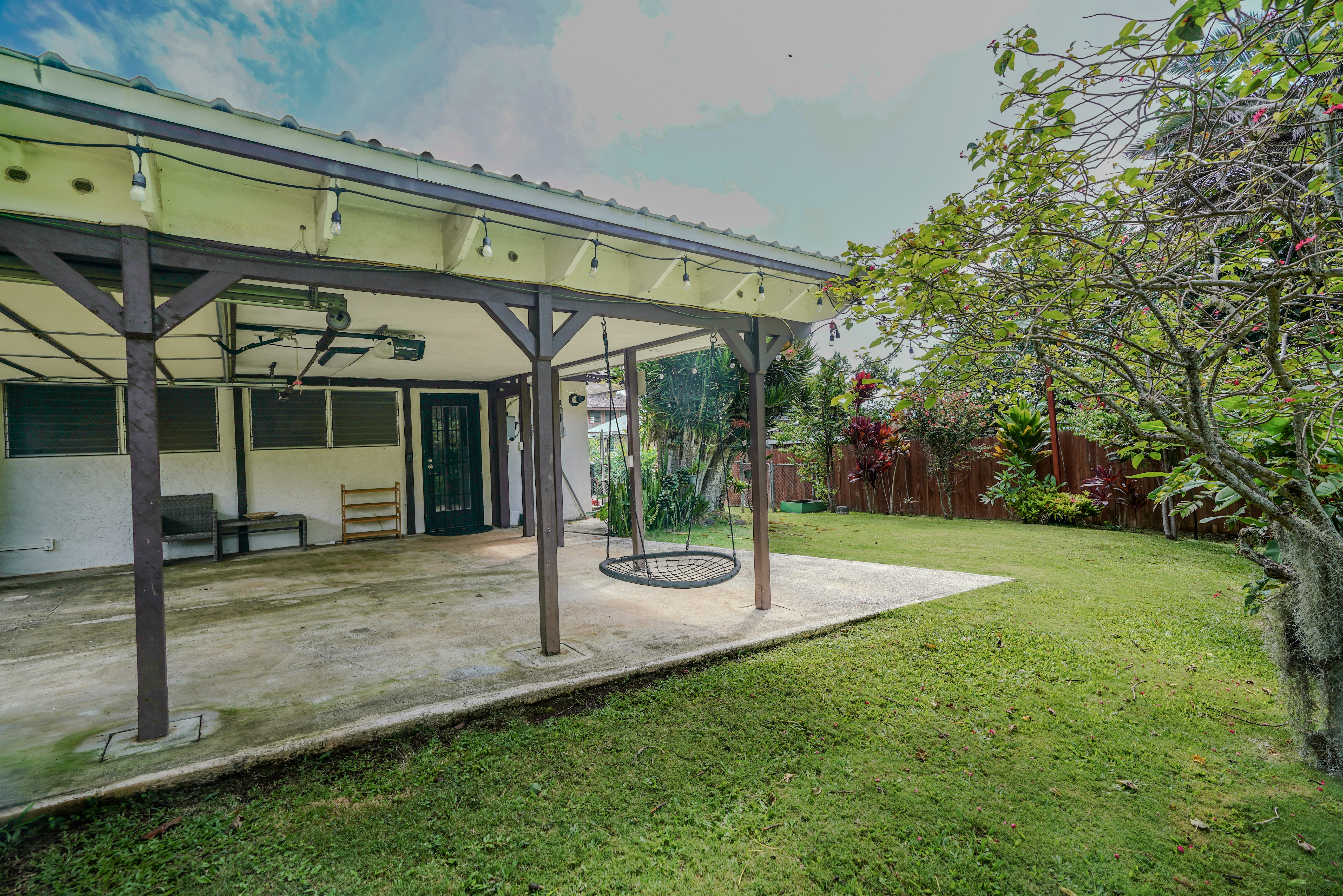 316 A Makani Road, Unit A Kapaa, HI 96746 - Photo 24 of 29 a view of a house with backyard and porch