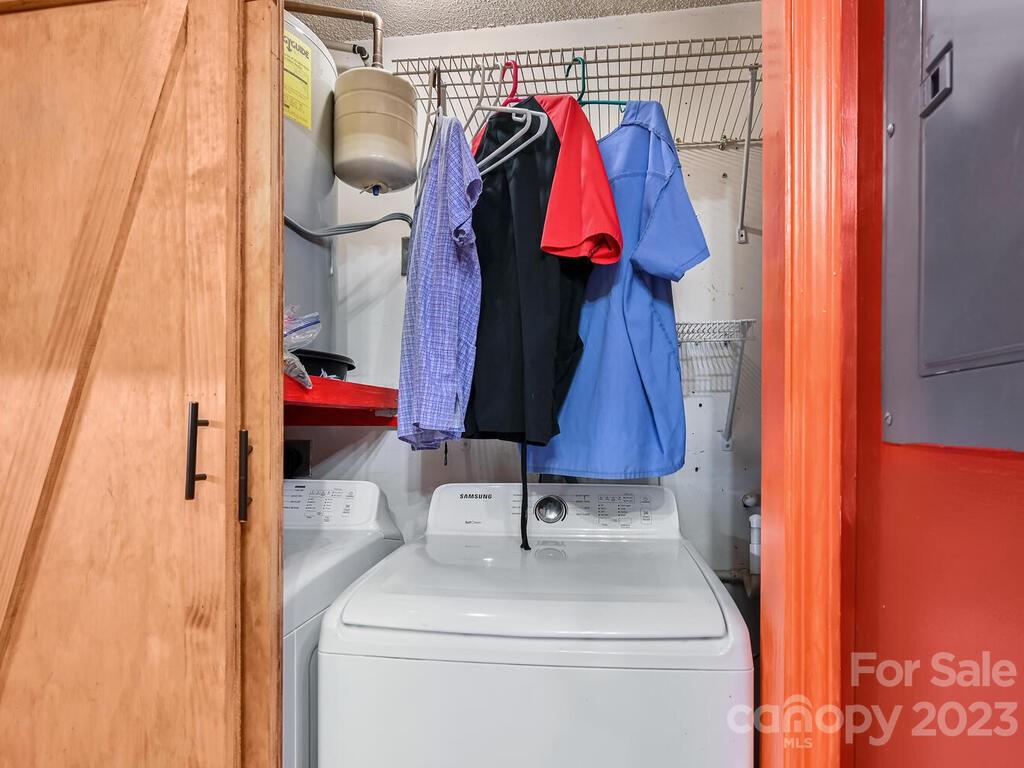 19 Krista Circle, Unit E Candler, NC 28715 - Photo 11 of 23 a utility room with dryer and washer