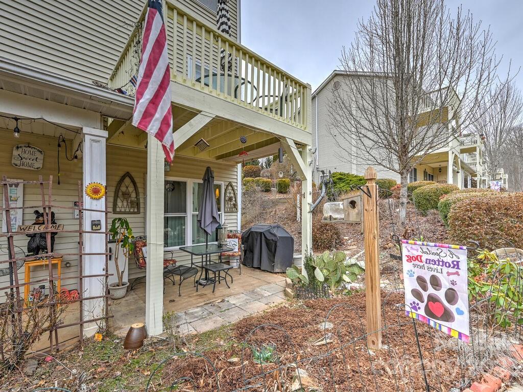 19 Krista Circle, Unit E Candler, NC 28715 - Photo 16 of 23 a front view of multi story residential apartment building with yard
